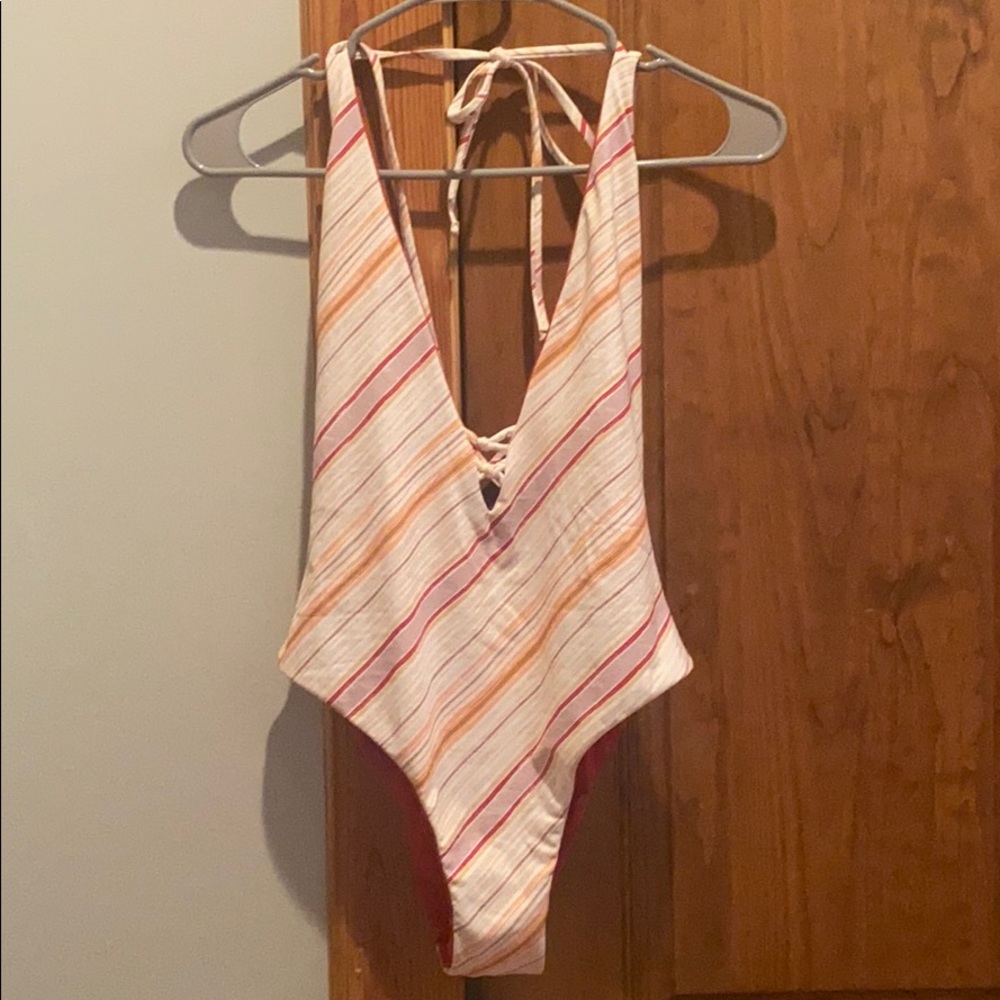 Optional reversible one piece